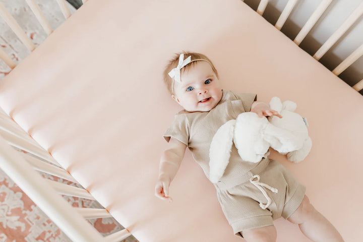 Copper Pearl Premium Knit Fitted Crib Sheet in Blush