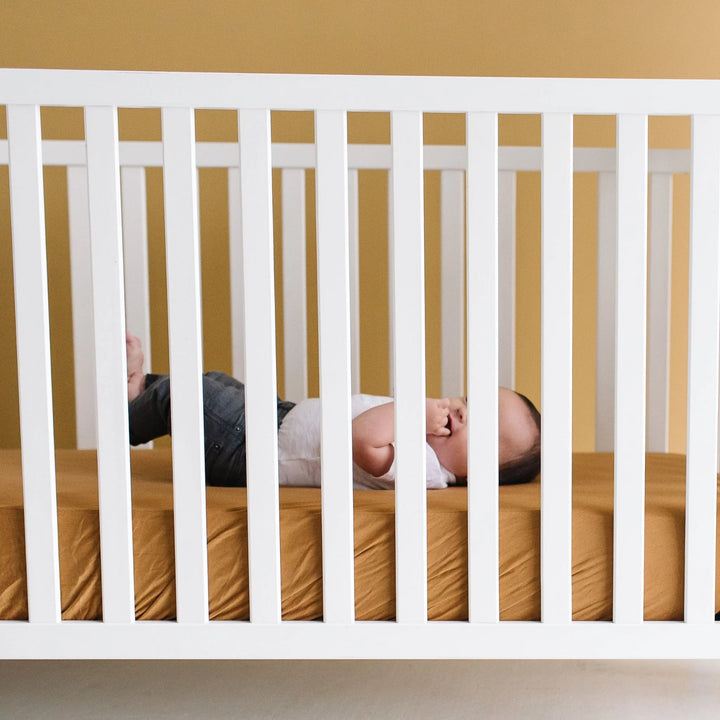 Copper Pearl Premium Knit Fitted Crib Sheet in Camel
