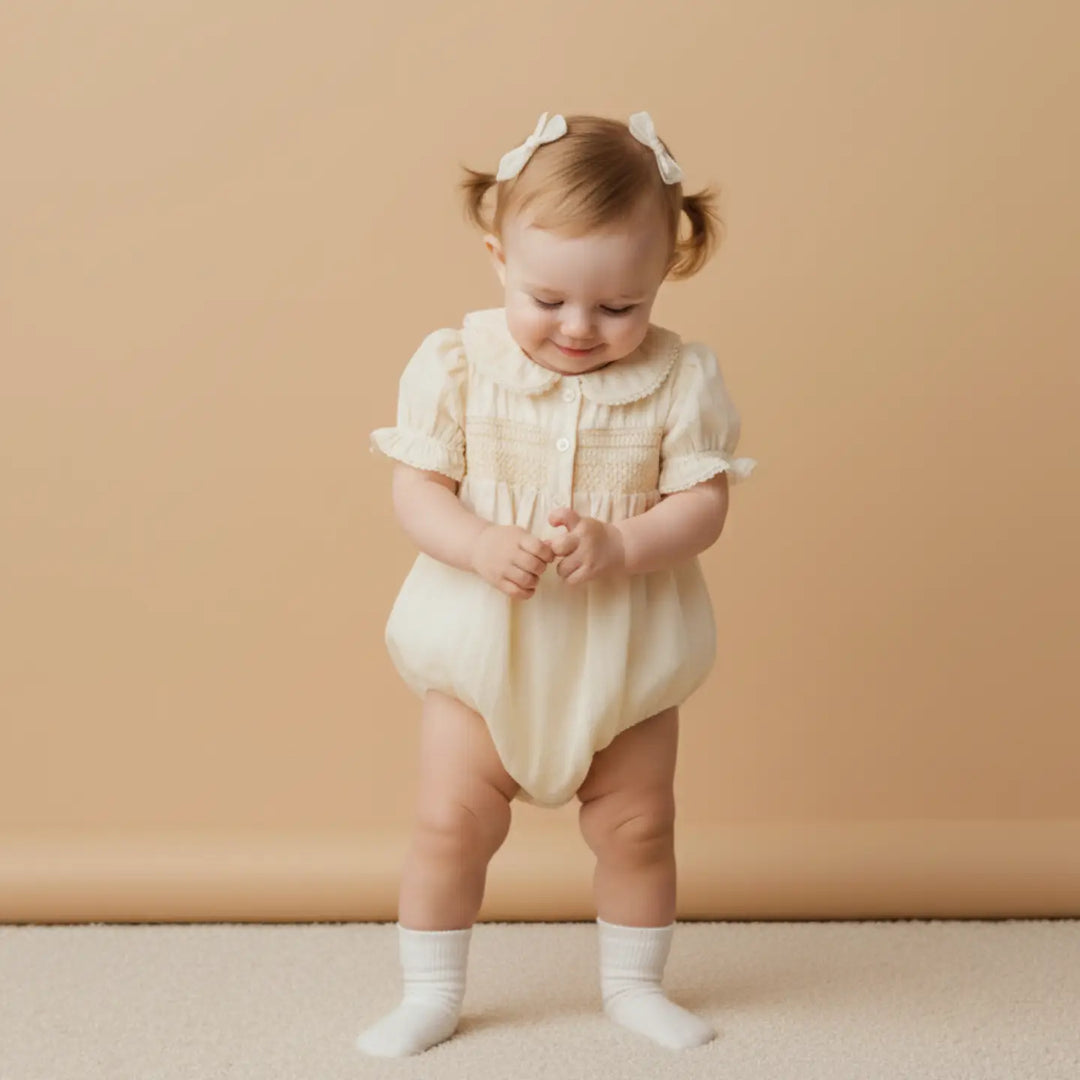 Makemake Organics Smocked Button Romper - Butter Yellow