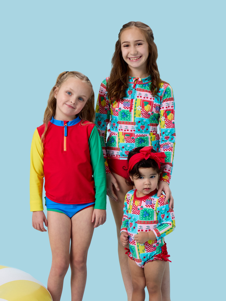 RuffleButts + RuggedButts Long Sleeve One Piece Rash Guard Swimsuit - Picnic Party Patchwork