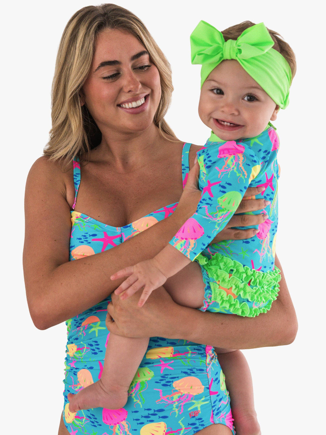 RuffleButts + RuggedButtsLong Sleeve One Piece Rash Guard Swimsuit - Neon Jelly Time