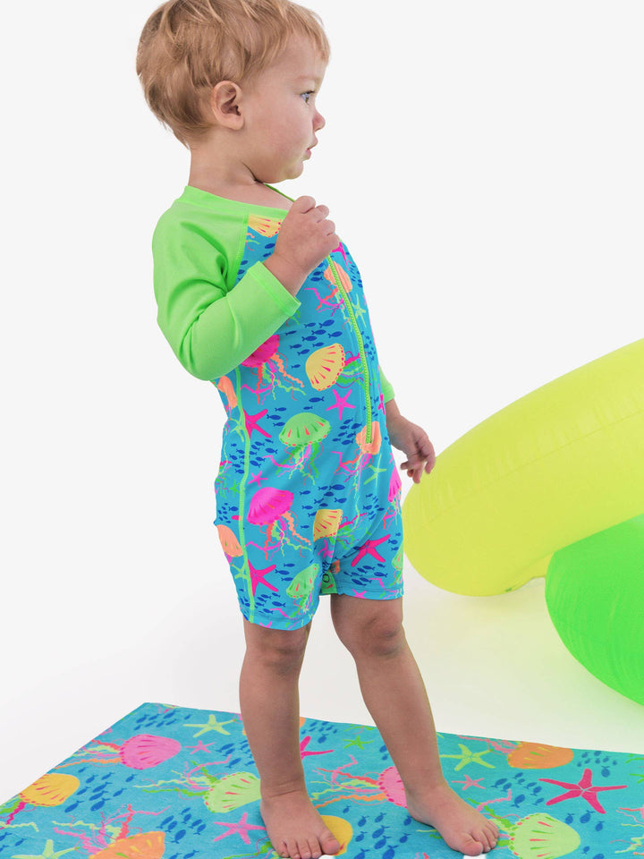RuffleButts + RuggedButts Long Sleeve One Piece Rash Guard Swimsuit - Neon Jelly Time