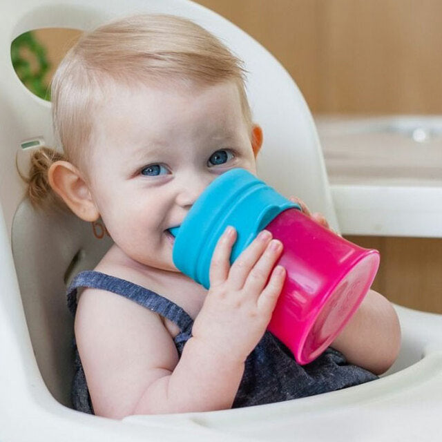https://babyongrand.com/cdn/shop/products/Snug-Spout---Universal-Silicone-Sippy-Lids-and-Cup--Pink-Multi-1__40991.1605666709.jpg?v=1642774175&width=720